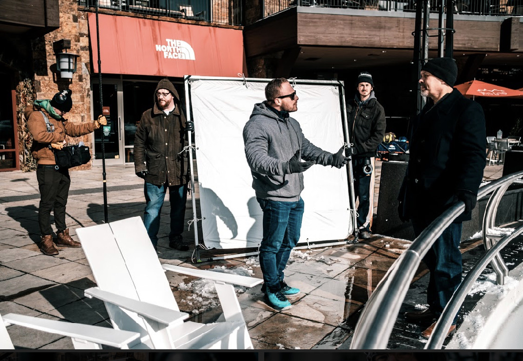 FuturaComm director working with crew on location