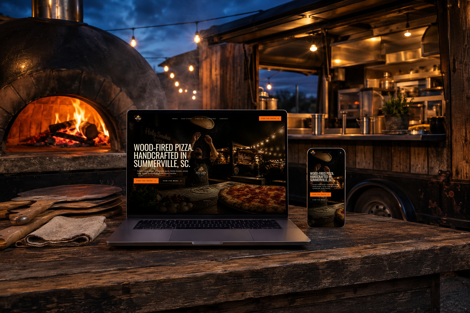 Holy Smokes Pizza responsive digital presentation shown on a laptop and phone