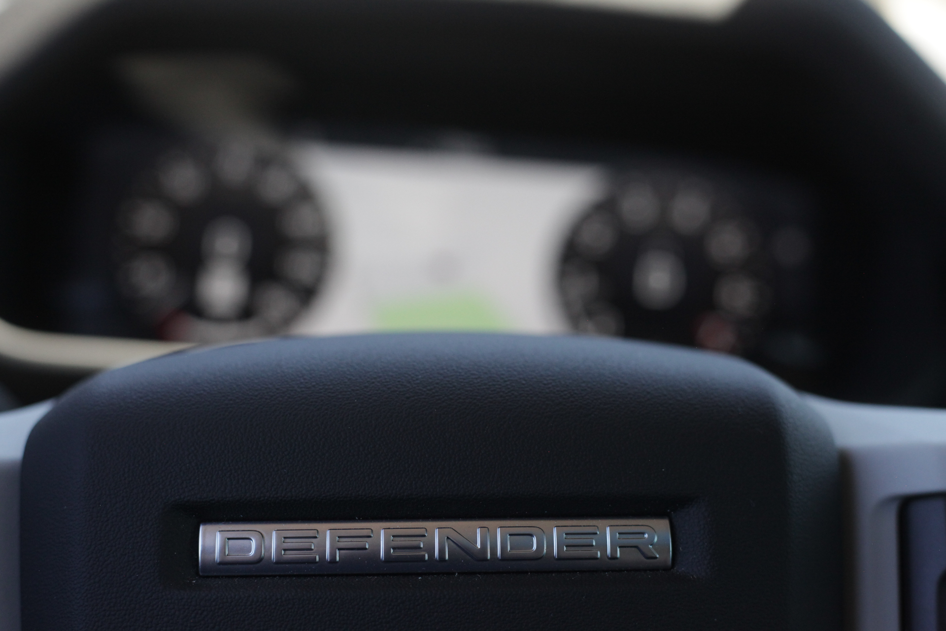 Defender steering wheel and instrument detail photographed for the partnership