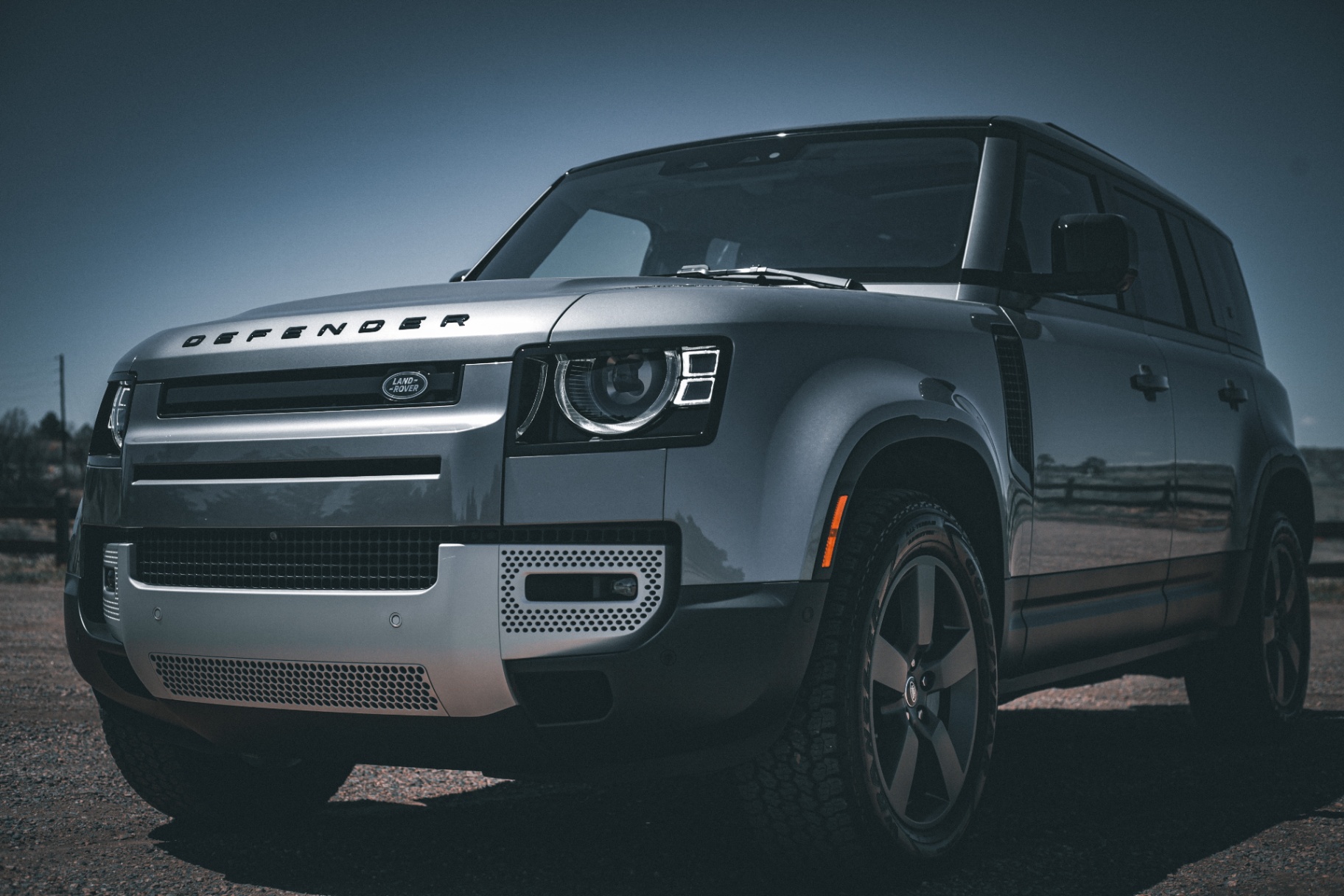 Land Rover Defender photographed three-quarter front for the series