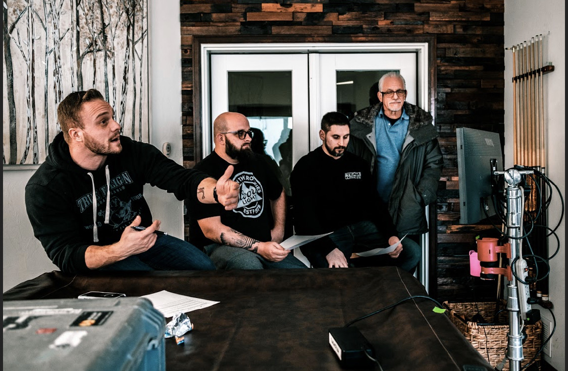 Client and creative team reviewing the cut together