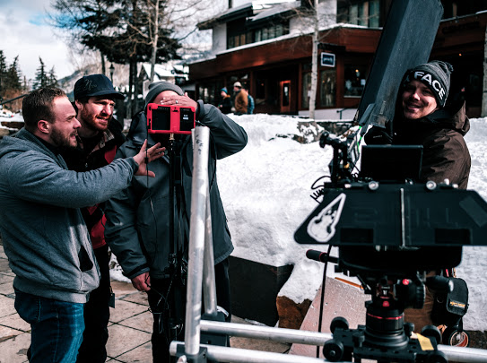 Crew huddle before a take