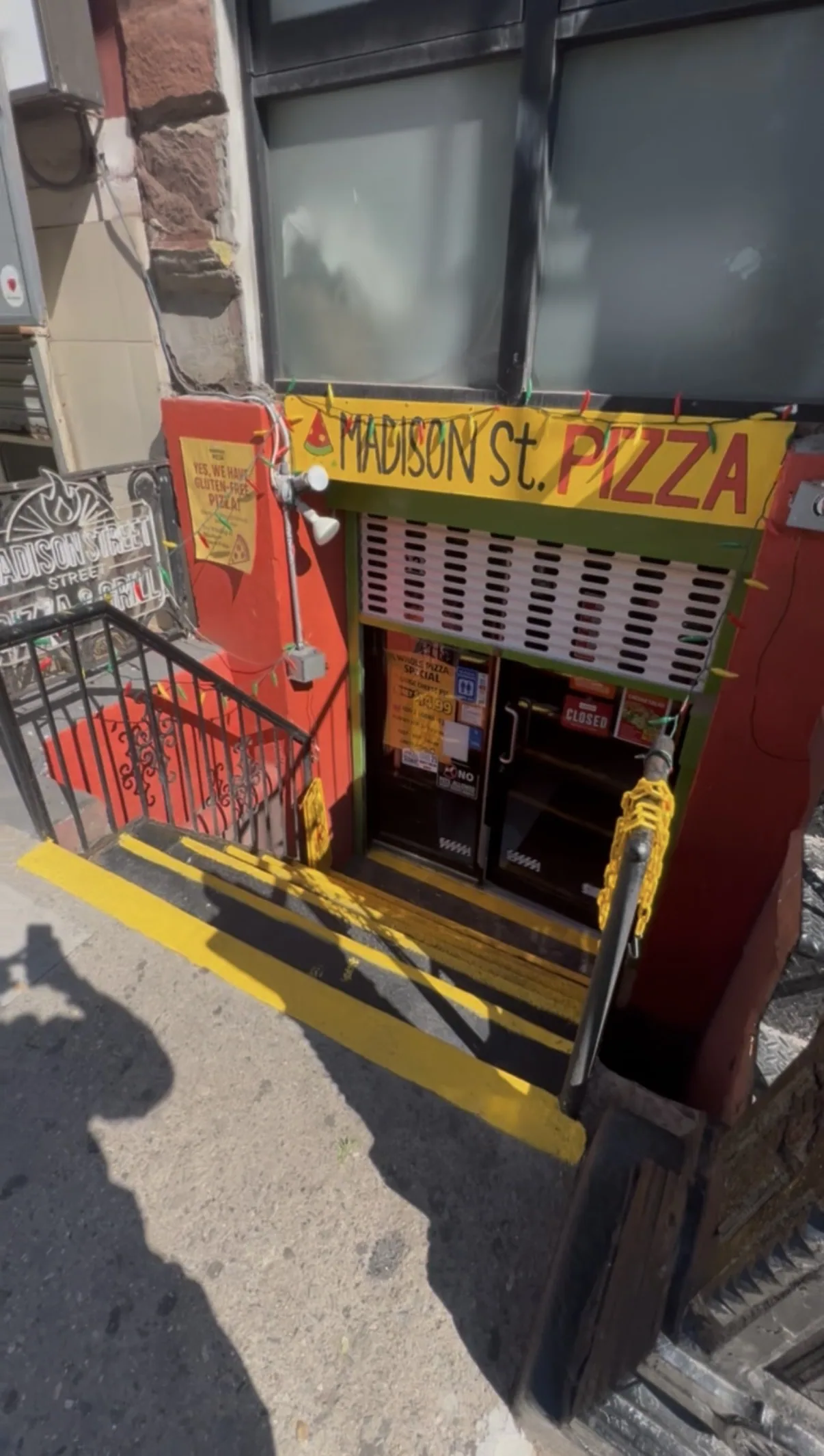 The Madison Street storefront photographed as acquired